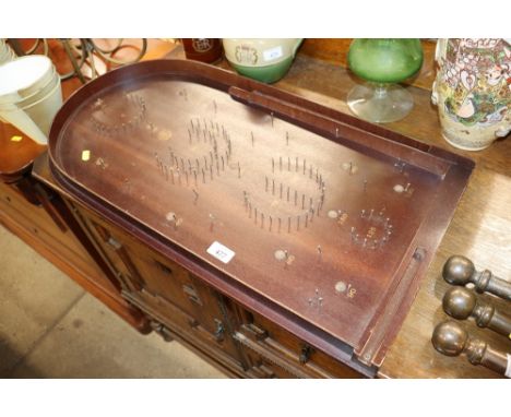 A Past Times bagatelle board