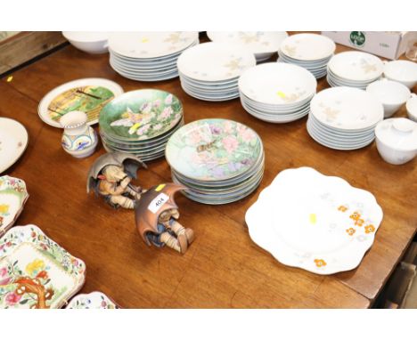 A pair of Goebel figures depicting children under umbrellas and a quantity of collector's plates etc.