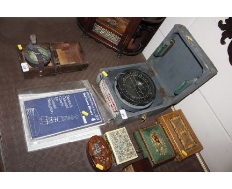 A ships compass in fitted box, Suffolk and Essex river navigation maps etc