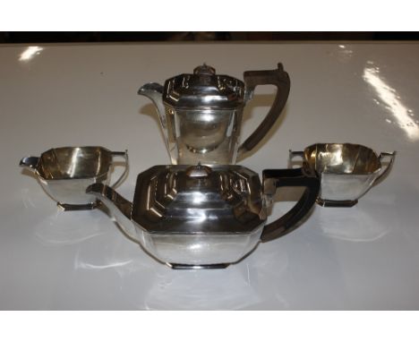 A silver four piece tea set, George Howson Sheffield 1934, comprising tea pot approx. 640gms, coffee pot approx. 645gms, crea