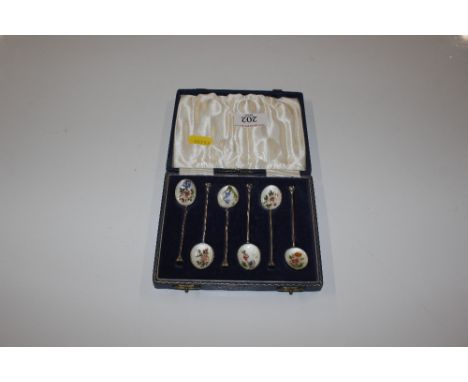 A cased set of six silver and enamel decorated coffee spoons 