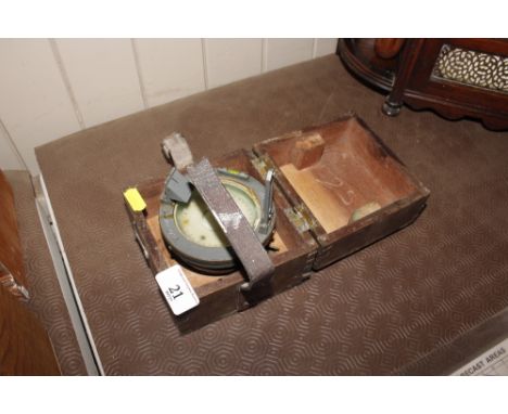 A small ships compass in fitted box