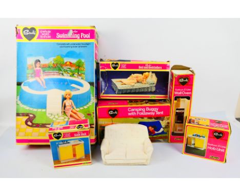Pedigree - Sindy - A mainly boxed collection of Sindy accessories. Lot includes Sindy Swimming Pool; Camping Buggy with Folda