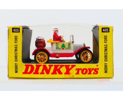 Dinky Toys - A boxed Dinky Toys #485 'Merry Christmas Model T Ford'. The model with Father Christmas figure appears to be in 