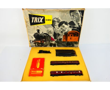 Trix - A boxed OO gauge Trix Train Set # 1295 with an 0-6-0 tank engine number 32103, 2 x maroon coaches, a boxed bridge, a b