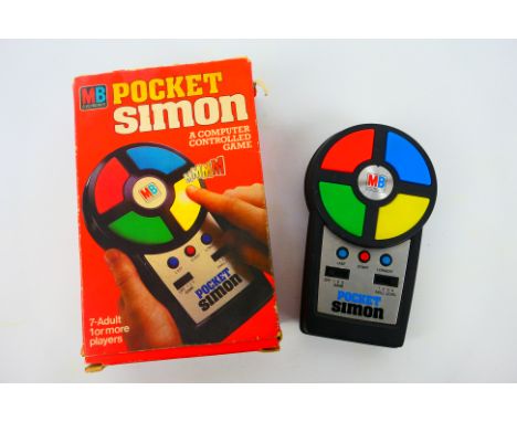 Pocket Simon - MB Electronics. A boxed #073561 Pocket Simon by MB Electronics. I have tested with Two AA type and One 6LR6 ba
