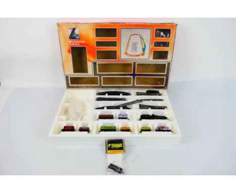 Lima - Graham Farish - a boxed Lima N gauge train set with a bagged Graham Farish N gauge chassis. Lot consists of Lima 12016