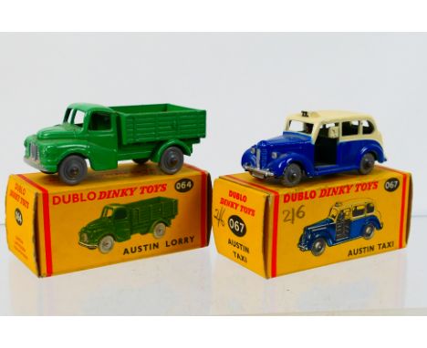 Dinky Dublo - Two boxed Dinky Dublo diecast model vehicles. Lot consists of Dinky Dublo #067 Austin Taxi; plus #064  Austin L