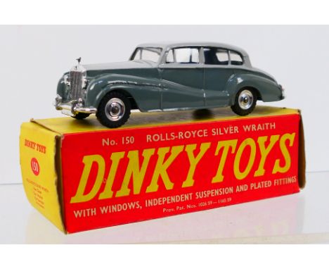 Dinky Toys - A boxed Dinky Toys #150 Rolls Royce Silver Wraith. The model in two-tone grey, with suspension and spun hubs, ha
