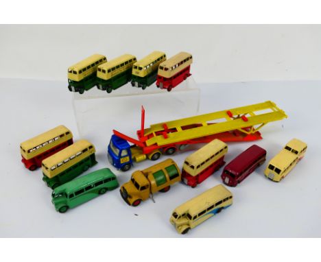 Dinky Toys - An unboxed collection of 13 playworn Dinky Toys, mainly buses. Lot includes Dinky Toys Hoyner Car Transporter; #