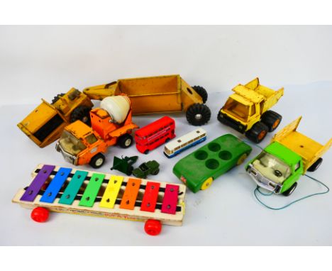 Boomaroo - Tonka - Buddy L - Fisher Price - A collection of pressed metal trucks including an Australian Boomaroo Dumper truc