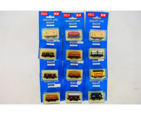 Peco - 12 boxed N gauge wagons. Lot includes Peco NR-P167 Tank Wagon 'United Dairies'; NR-P141 Box Van 'Colmans'; NR-40S 5 Pl