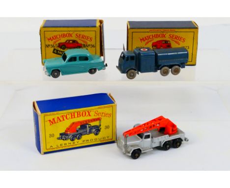 Matchbox - Moko - Lesney - Three boxed Matchbox regular wheels diecast model vehicles. Lot consists of Matchbox #30 Magirus D