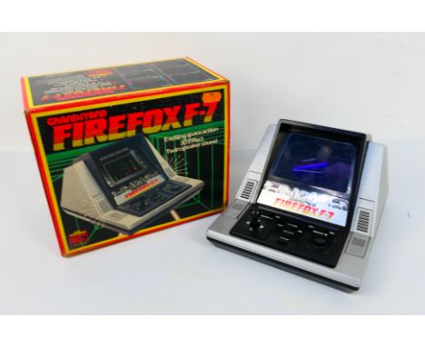 Grandstand - Firefox F7. A boxed #11279 Firefox F-7, Exciting Space Action, 3D effect, twin speaker sound. Tested with Four t