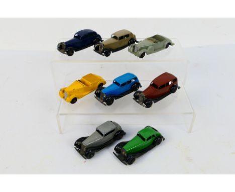 Dinky Toys - A group of 8 unboxed Dinky Toys. Lot includes Dinky Toys 38b Sunbeam Talbot; 30d Vauxhall Saloon; 36d Rover and 