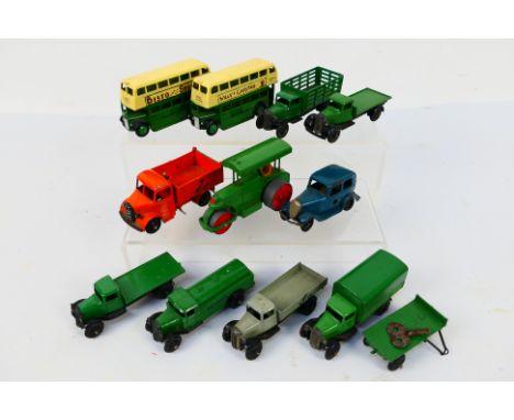 Dinky Toys - Minic - A group of unboxed Dinky Toys and a Minic Clockwork Austin. Lot includes Dinky Toys 410 Bedford Tipper; 