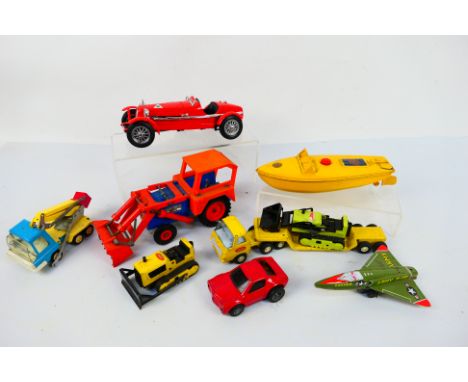 Sutcliffe - Tonka - Bburago - Tri-ang - A group of models including a Sutcliffe Comet clockwork boat, a Tri-ang tractor, a To