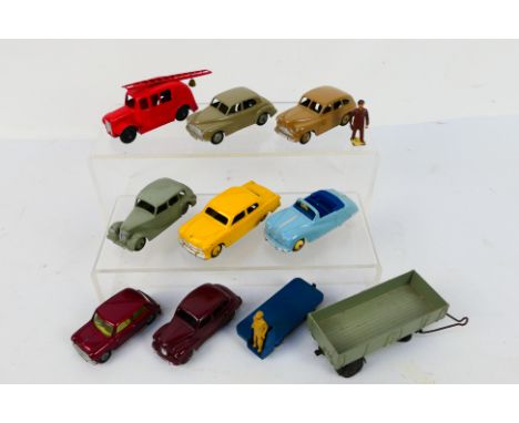 Dinky Toys - A group of unboxed Dinky Toys. Lot includes Dinky Toys 106 Austin Atlantic; 152 Austin Devon; 170 Ford Fordor Se