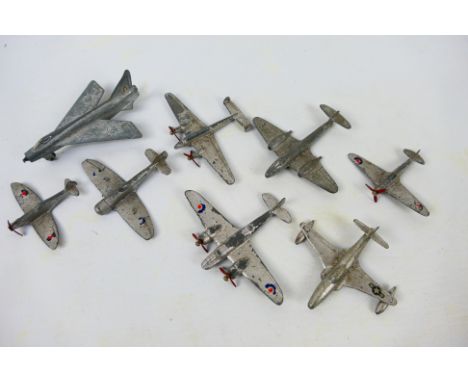 Dinky Toys - Eight unboxed Dinky Toys model aircraft. Lot includes 66e Medium Bomber; 718 Hawker Hurricane; 737 Lightning; 70