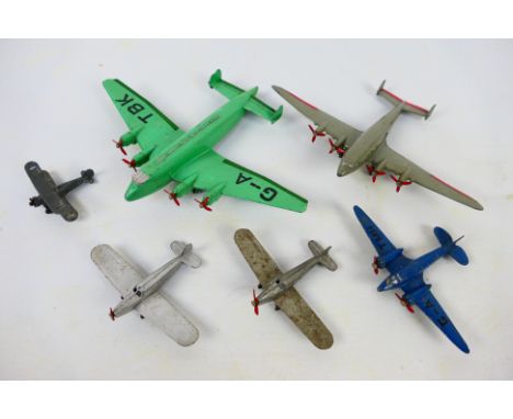 Dinky Toys - Six unboxed Dinky Toys model aircraft. Lot includes 62m Light Transport Plane; 62r Four Engined Liner; 60K Light