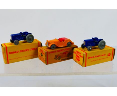 Dinky Dublo - Three boxed Dinky Dublo diecast model vehicles. Lot consists of Dinky Dublo #069 Massey -Harris Ferguson Tracto