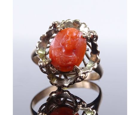 A 19th century unmarked gold relief carved coral cameo ring, setting height 16.6mm, size M, 2.3gGood overall condition, coral