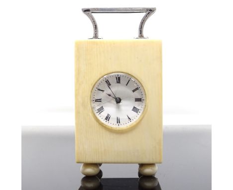 A miniature ivory-cased carriage clock, with silver swing handle on ivory ball feet, enamel dial with French 8-day movement, 