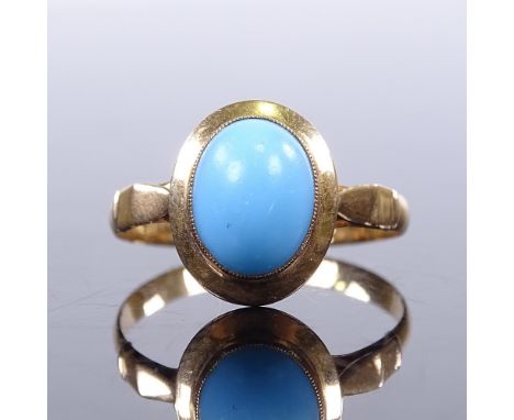 A Middle Eastern high carat gold cabochon blue glass dress ring, setting height 12.9mm, size Q, 2gVery good original conditio