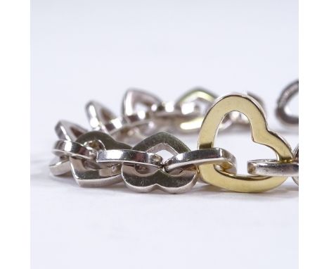 TIFFANY & CO - a sterling silver and 18ct gold multi-heart link bracelet, dated 2000, bracelet length 19cm, 36gVery good orig