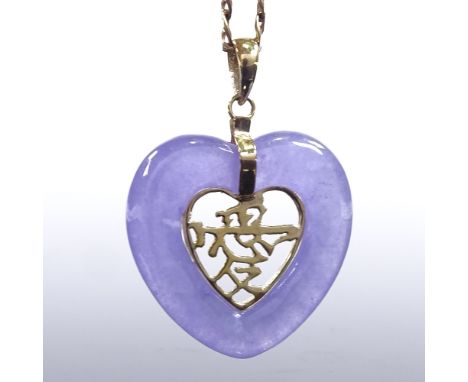 A Chinese lavender jadeite heart pendant necklace, on 9ct gold and flat anchor link chain, and a 9ct charm bracelet, chain le