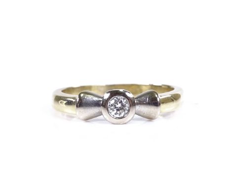 An unmarked gold 0.1ct solitaire diamond dress ring, setting height 4.9mm, size L/M, 3.5gGood overall condition, diamond is b