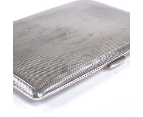 An Elizabeth II rectangular silver cigarette case, allover engine turned decoration, by S J Rose & Son, hallmarks Birmingham 