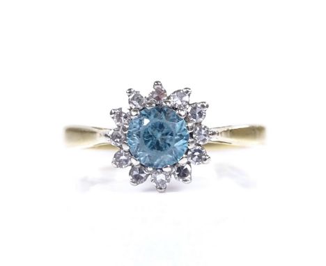 A late 20th century 18ct gold blue zircon and diamond cluster flowerhead dress ring, by Rum Co, total diamond content approx 
