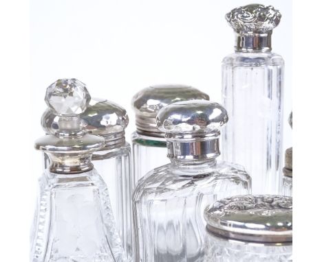 Group of silver topped dressing table jars and scent bottles (7)Lot sold as seen unless specific item(s) requested 