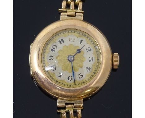 A lady's Vintage 9ct gold mechanical dress wristwatch, gilt dial with painted Arabic numerals, blued steel hands and 9ct gate