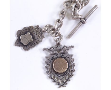 An early 20th century silver Albert chain, with 2x dog clips, 1x T-Bar and 2x silver fobs, by Henry Pope, chain hallmark Birm