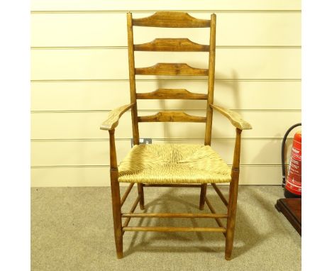 An Arts and Crafts ladder-back armchair by Philip Clissett, circa 1890 