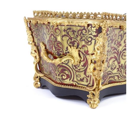 An ornate French Boulle marquetry jardiniere/planter, brass and tortoiseshell marquetry inlaid serpentine-shaped sides, with 