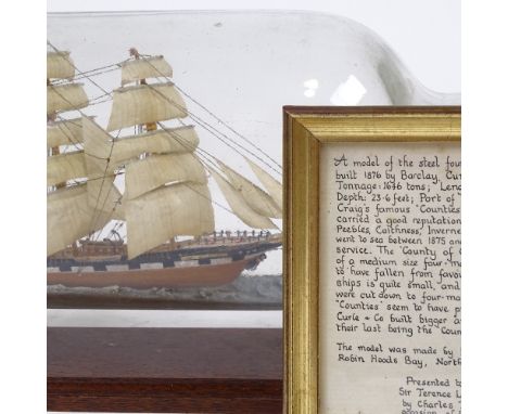 A Vintage ship in a bottle, The County Of Caithness, with description of ship in frame, bottle length 36cm 