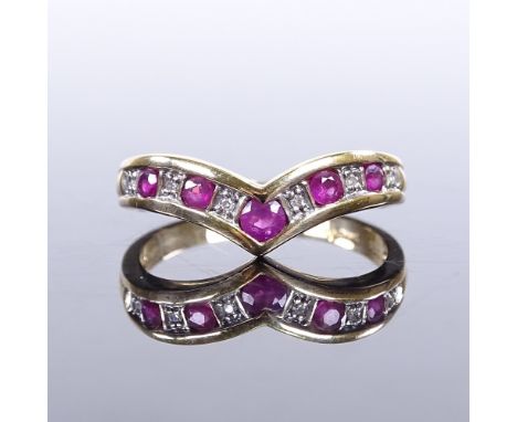 A 9ct gold ruby and diamond wishbone ring, setting height 7.3mm, size O, 2.3gVery good original condition, all stones present