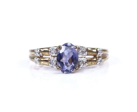A modern 9ct gold amethyst and diamond dress ring, bamboo style shoulders, setting height 7mm, size M, 2.3gGood original cond