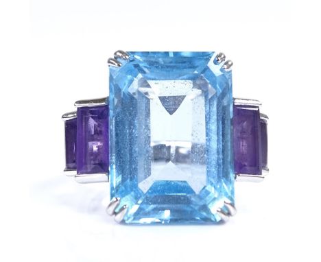 An Art Deco style 18ct white gold blue topaz and amethyst cocktail ring, topaz length 17.9mm, size N, 11.3gVery good original