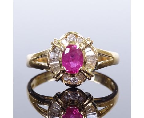 An 18ct gold ruby and diamond cluster dress ring, set with round brilliant and tapered baguette-cut diamonds, setting height 