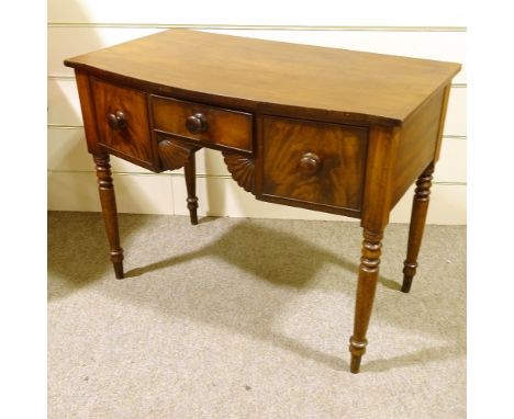 Early 19th century mahogany knee-hole sideboard of small size, with shell carved apron and ring turned legs, width 1.02mVery 