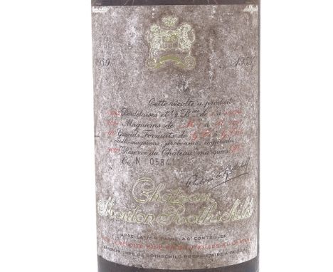 A bottle of Chateau Mouton Rothschild, Vintage 1959, Pauillac, Bottle No. 058411 