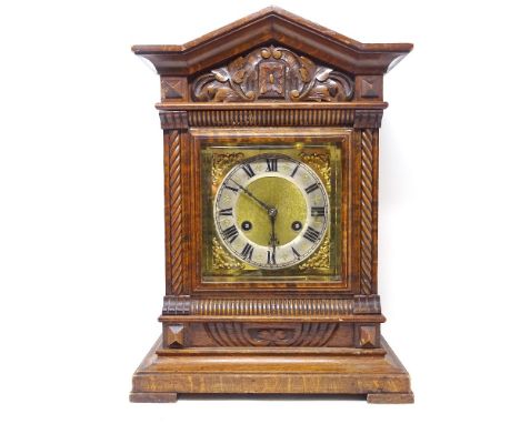 A 19th century carved walnut-cased mantel clock, acanthus carved case, square brass dial with silvered chapter ring, and 8-da