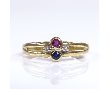 An 18ct gold ruby sapphire and diamond dress ring, setting height 6.5mm, size N, 2.7gVery good original condition, all stones