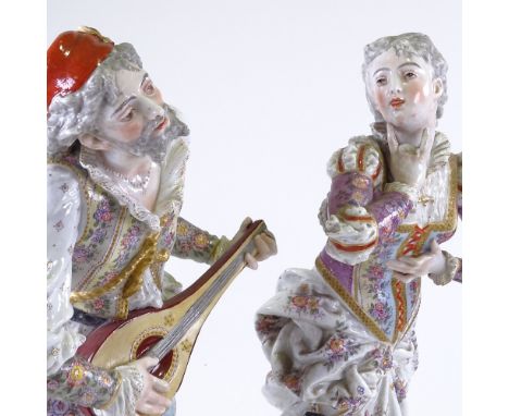 A pair of 19th century Continental porcelain figures, minstrel and lady, transfer anchor marks under base, height 62cmFigure 