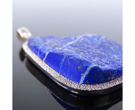 A large handmade sterling silver and rough-cut lapis lazuli pendant, pendant height excluding bale 59.6mm, 33gVery good origi