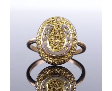 A 19th century unmarked yellow metal horseshoe panel ring, setting height 15.5mm, size J, 1.8gGood overall condition, ring ha